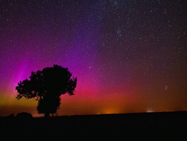 red and orange auroras