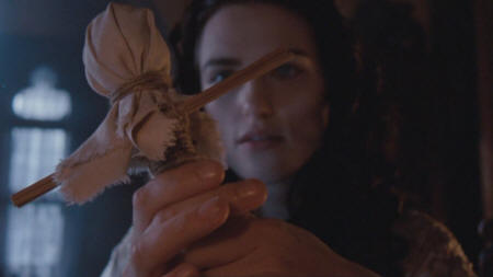 woman holding poppet