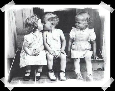 boy and girl kissing, other girl mad